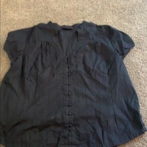 A black short sleeve button up blouse